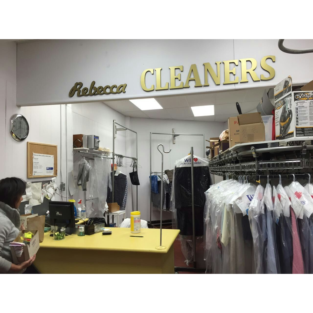 Inside Rebecca Cleaners — the counter and garment area